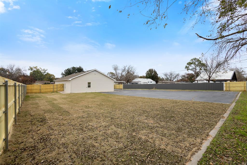 1812 Carpenter Street Bridgeport, TX 76426 - Photo 30 of 30 a view of a large tree with a yard