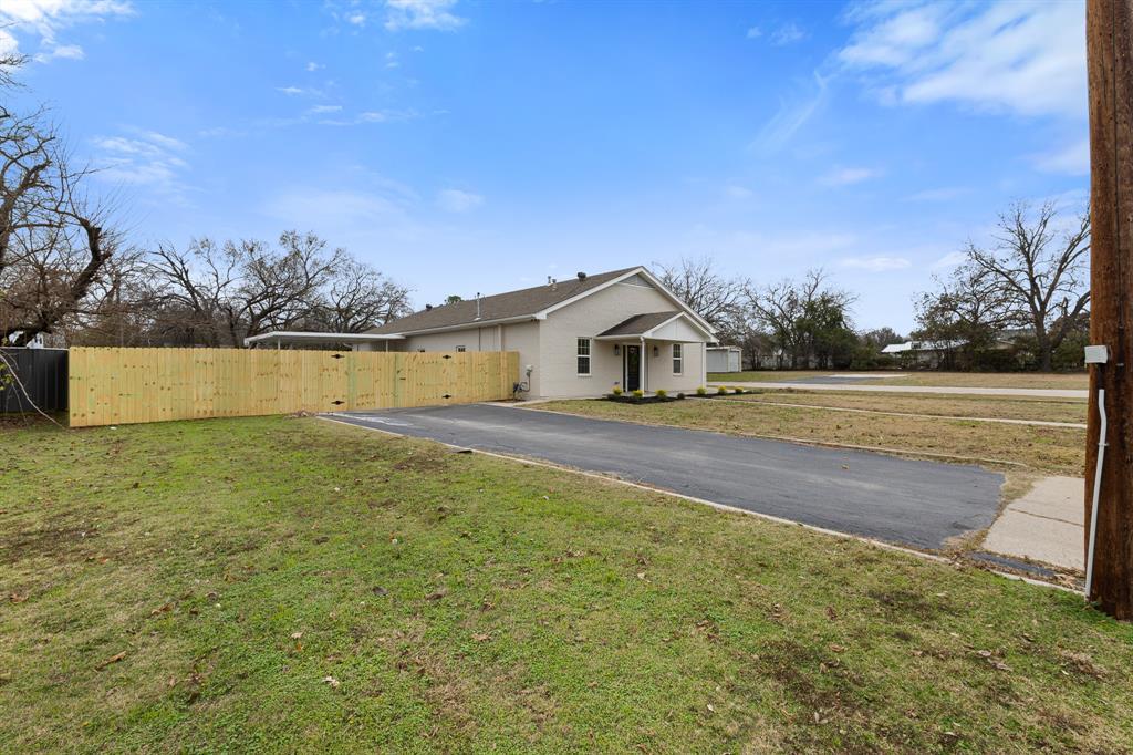 1812 Carpenter Street Bridgeport, TX 76426 - Photo 3 of 30 a view of an outdoor space and yard