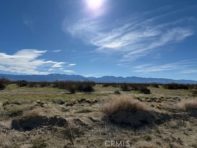 a view of an outdoor space and mountain view