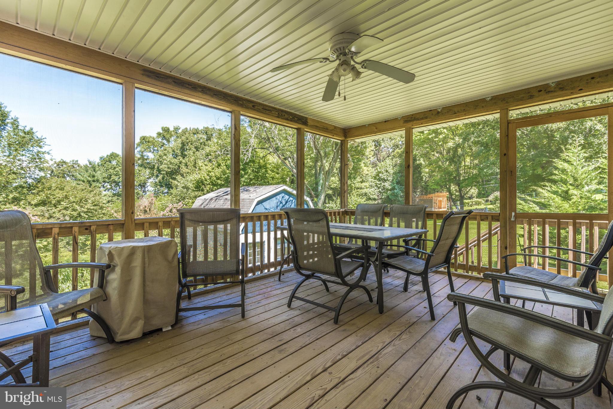 6324 Quinn Road Frederick, MD 21701 - Photo 23 of 30 Screened in porch leads to deck