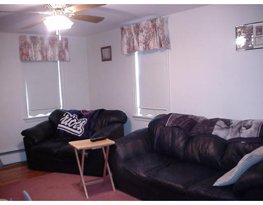 7 Stowecroft Road Arlington, MA 02474 - Photo 5 of 7 a living room with furniture and a lamp