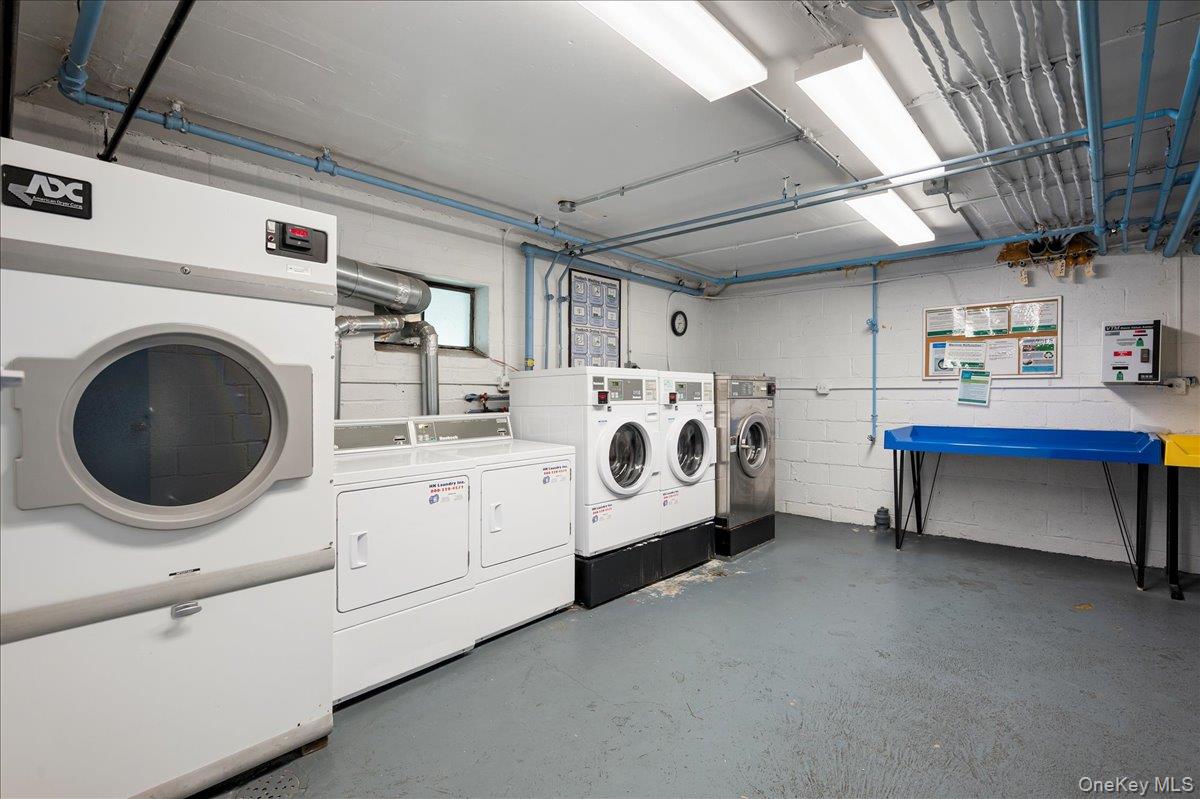 437 Pelham Road, Unit B2 New Rochelle, NY 10805 - Photo 16 of 17 a utility room with dryer and washer