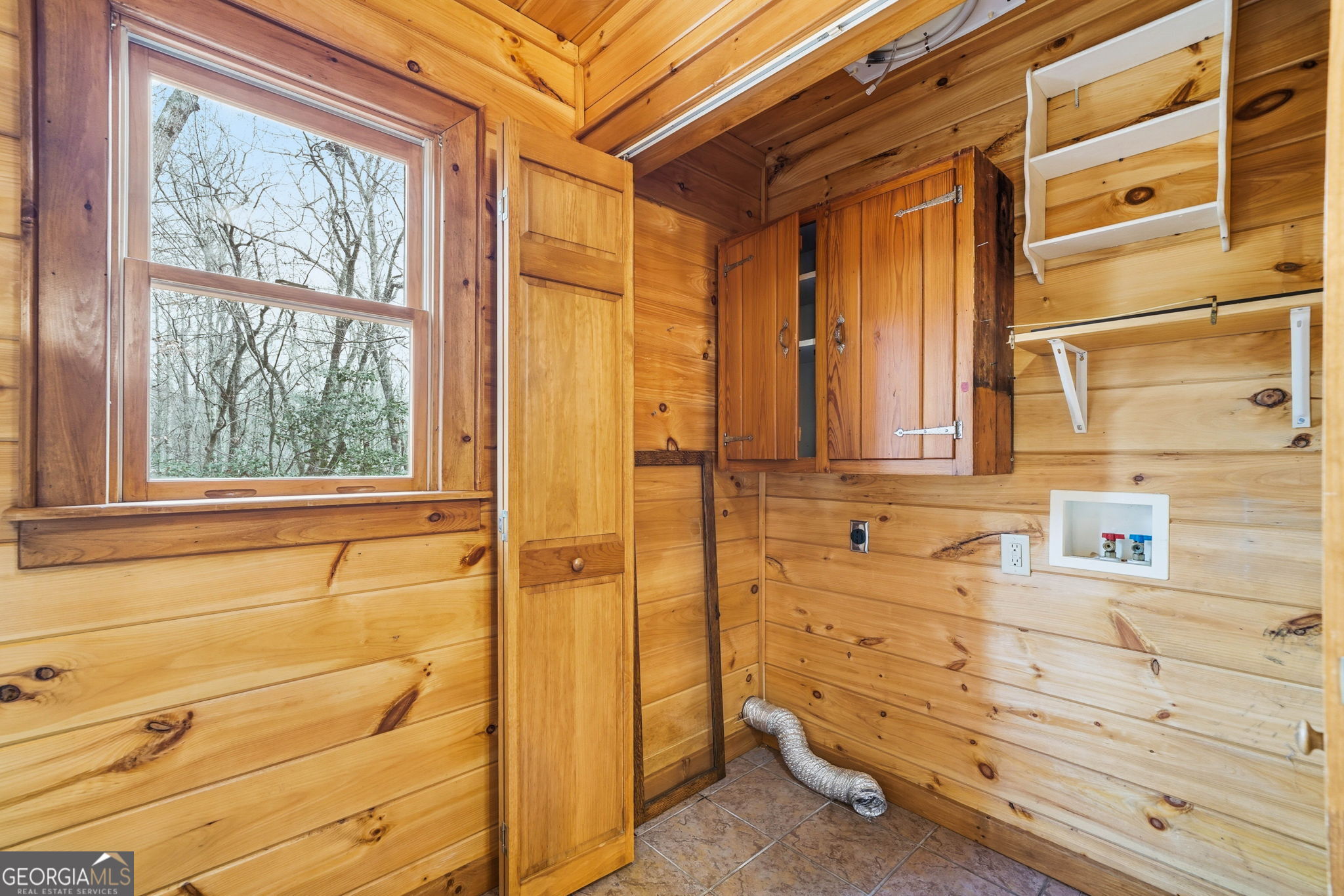 648 Stuart Mountain Road Mineral Bluff, GA 30559 - Photo 19 of 42 a bathroom with a bathtub and shower