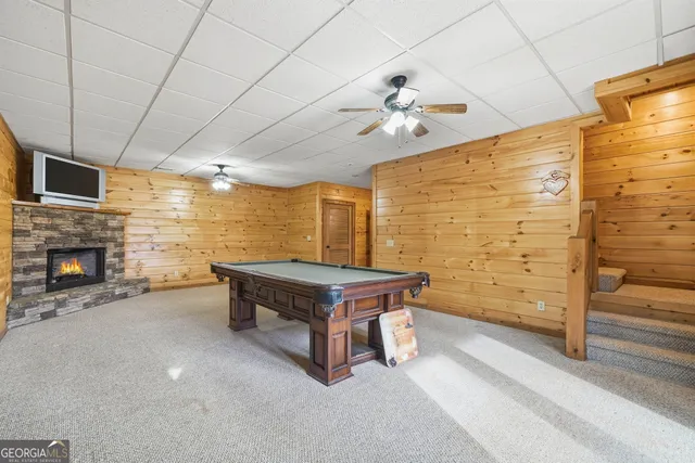a living room with a fireplace
