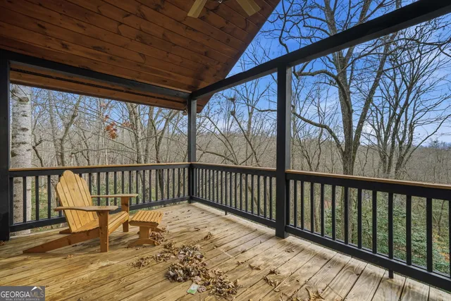 a view of balcony with wooden floor