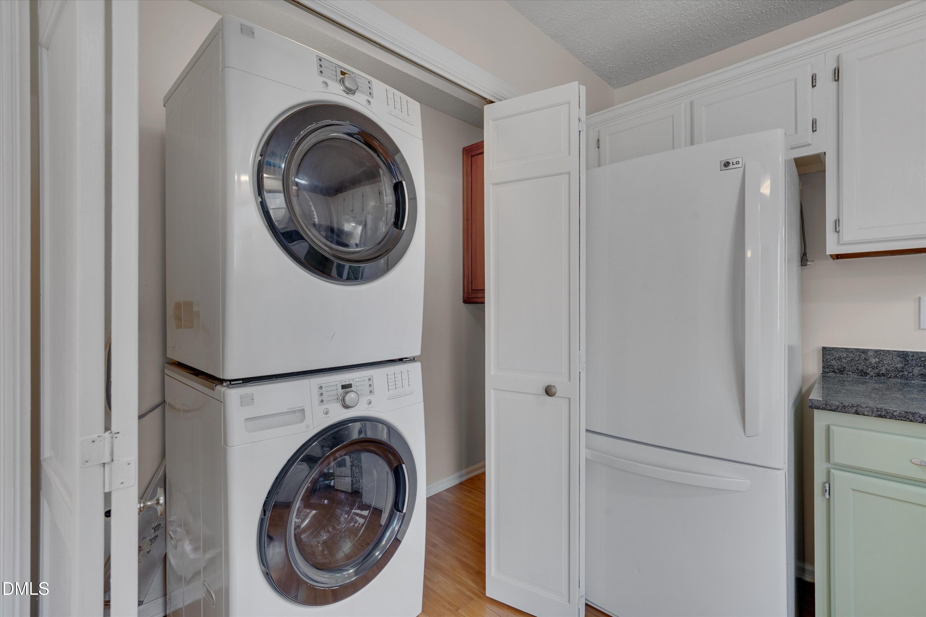 6528 Hearthstone Drive Raleigh, NC 27615 - Photo 14 of 32 a utility room with dryer and washer