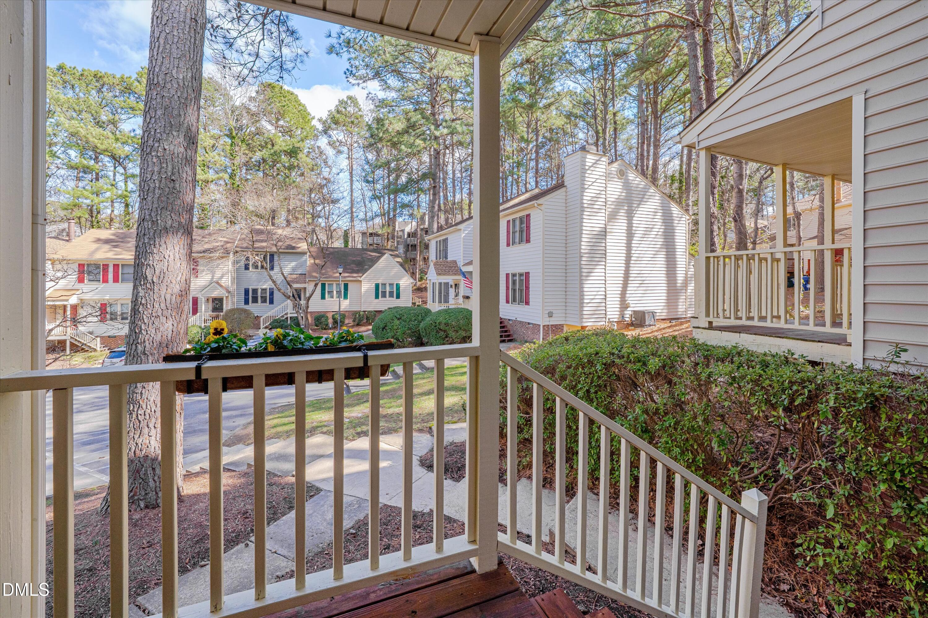 6528 Hearthstone Drive Raleigh, NC 27615 - Photo 5 of 32 a view of a street from a balcony