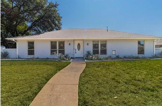 a view of a house with garden