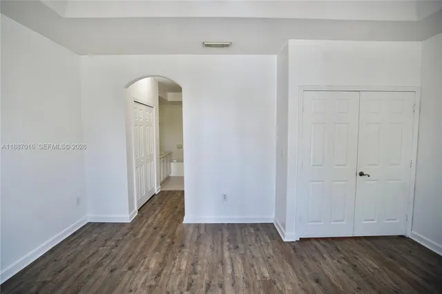a view of entryway with wooden floor