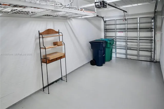 a view of front of a house with a garden