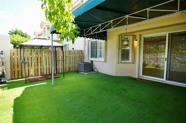 a view of a backyard with a garden