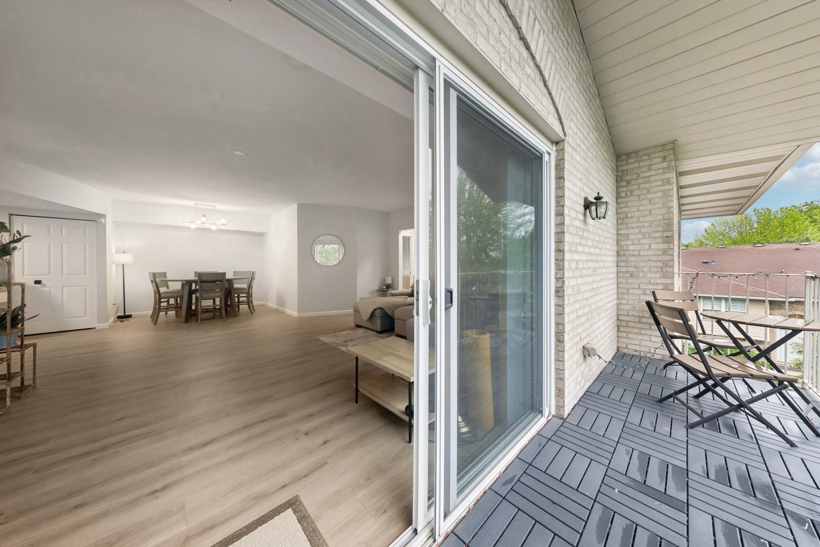 943 Elderberry Circle, Unit 303 Naperville, IL 60563 - Photo 16 of 19 a view of a room with furniture and wooden floor