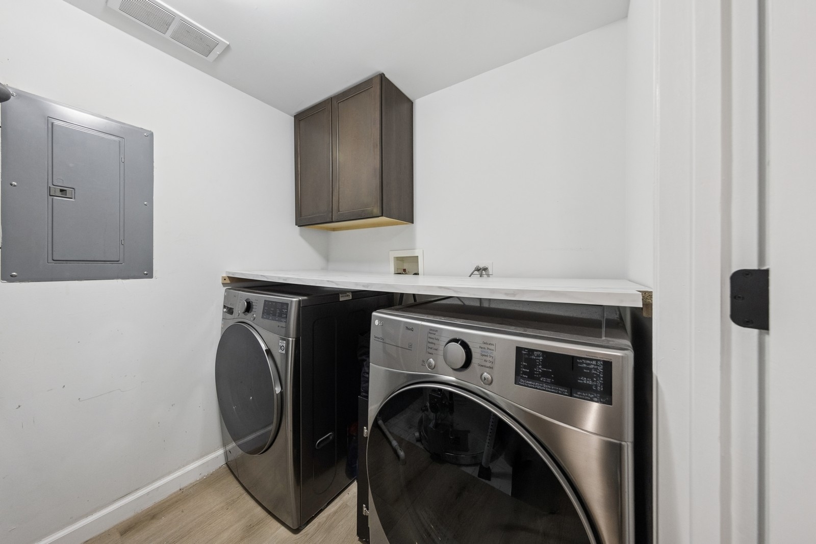 943 Elderberry Circle, Unit 303 Naperville, IL 60563 - Photo 17 of 19 a utility room with dryer and washer