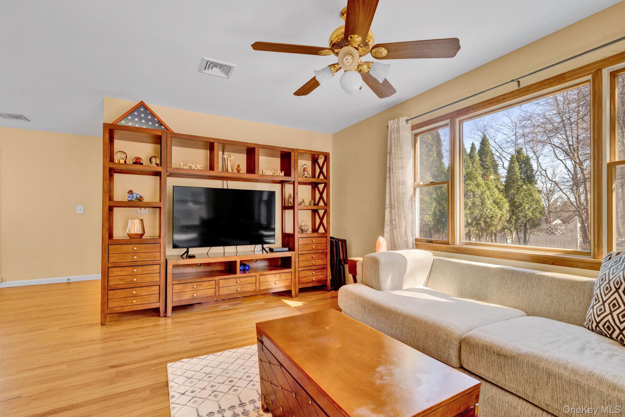 65 Jay Street Stony Point, NY 10980 - Photo 16 of 32 a living room with furniture and a flat screen tv