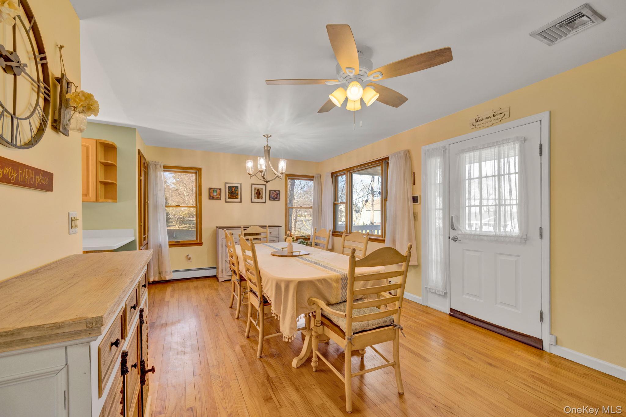 65 Jay Street Stony Point, NY 10980 - Photo 17 of 32 a view of a dining room with furniture window and wooden floor