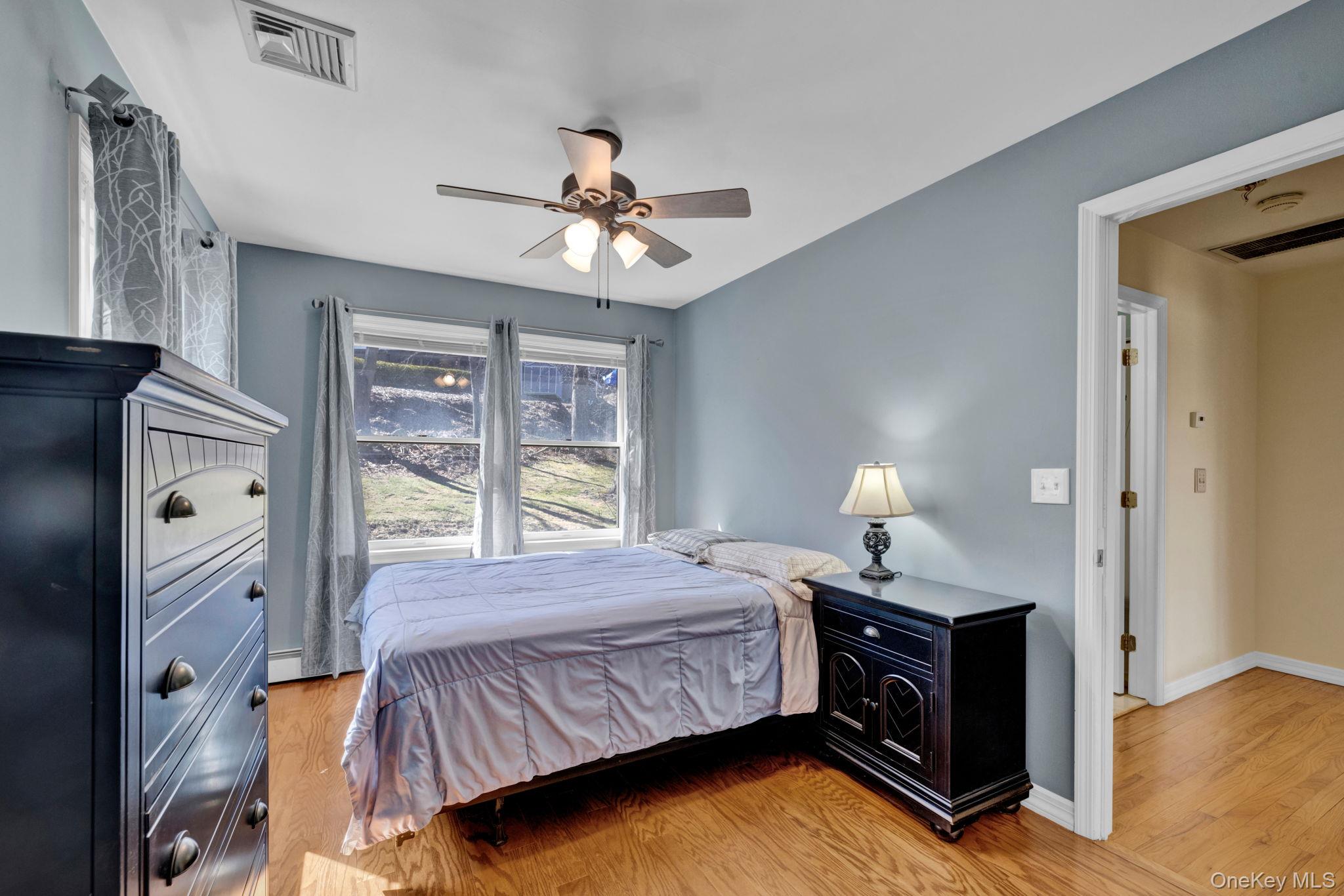 65 Jay Street Stony Point, NY 10980 - Photo 21 of 32 a bedroom with a bed and a window