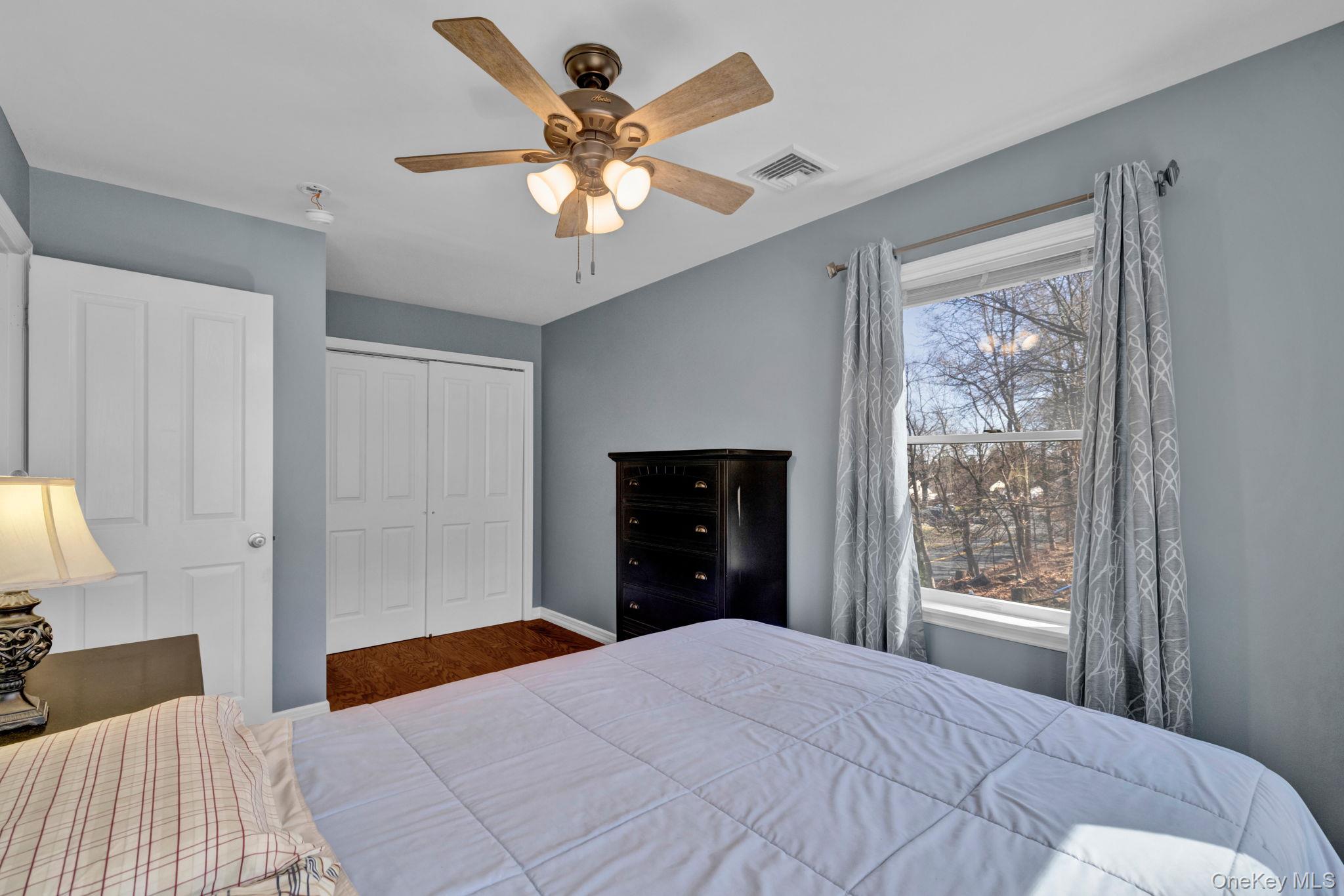 65 Jay Street Stony Point, NY 10980 - Photo 23 of 32 a bedroom with a large bed and a window