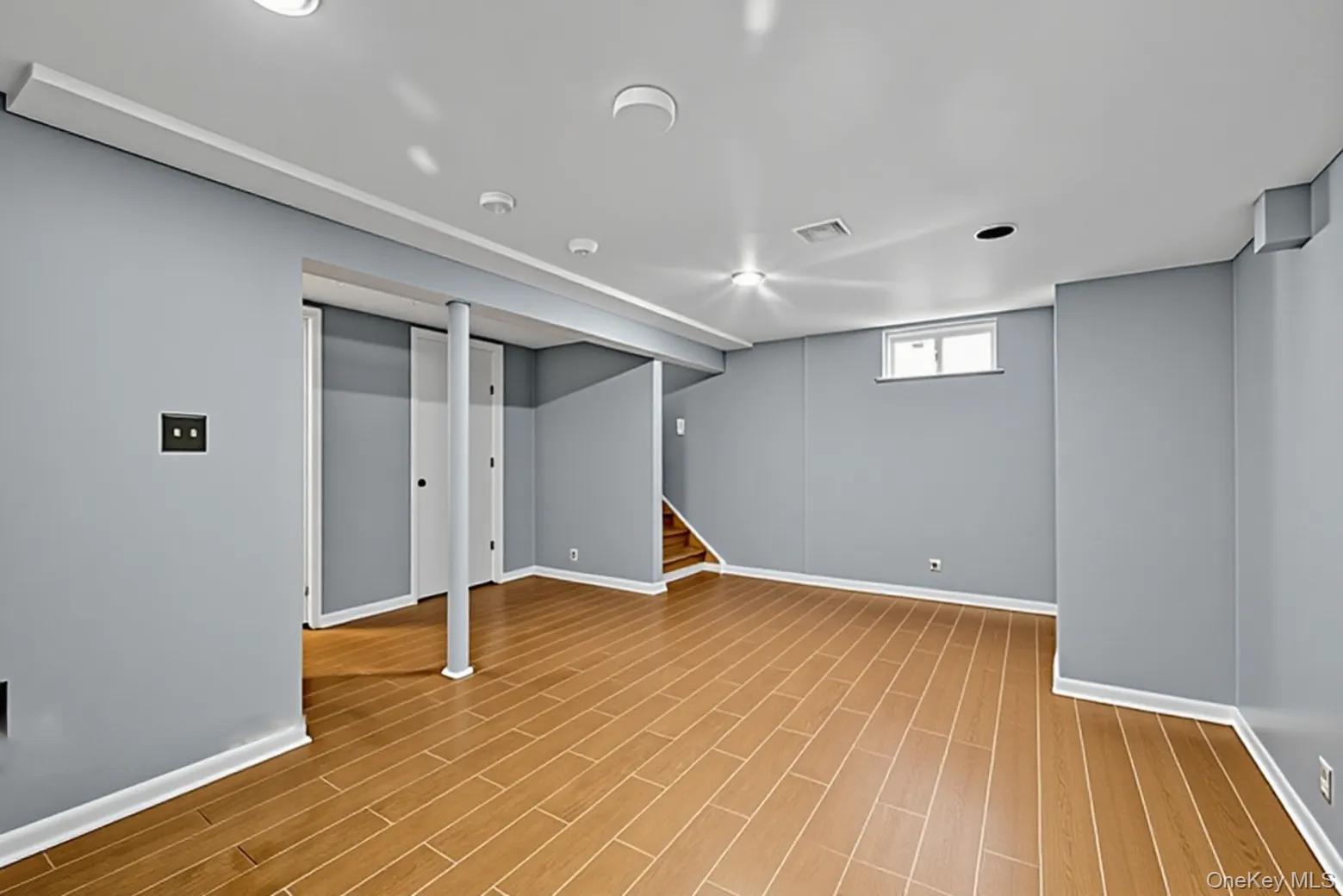 65 Jay Street Stony Point, NY 10980 - Photo 28 of 32 a view of an empty room with wooden floor