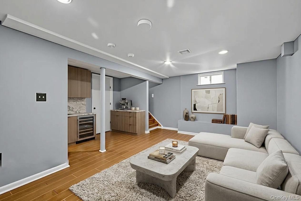 65 Jay Street Stony Point, NY 10980 - Photo 29 of 32 a living room with furniture and a wooden floor