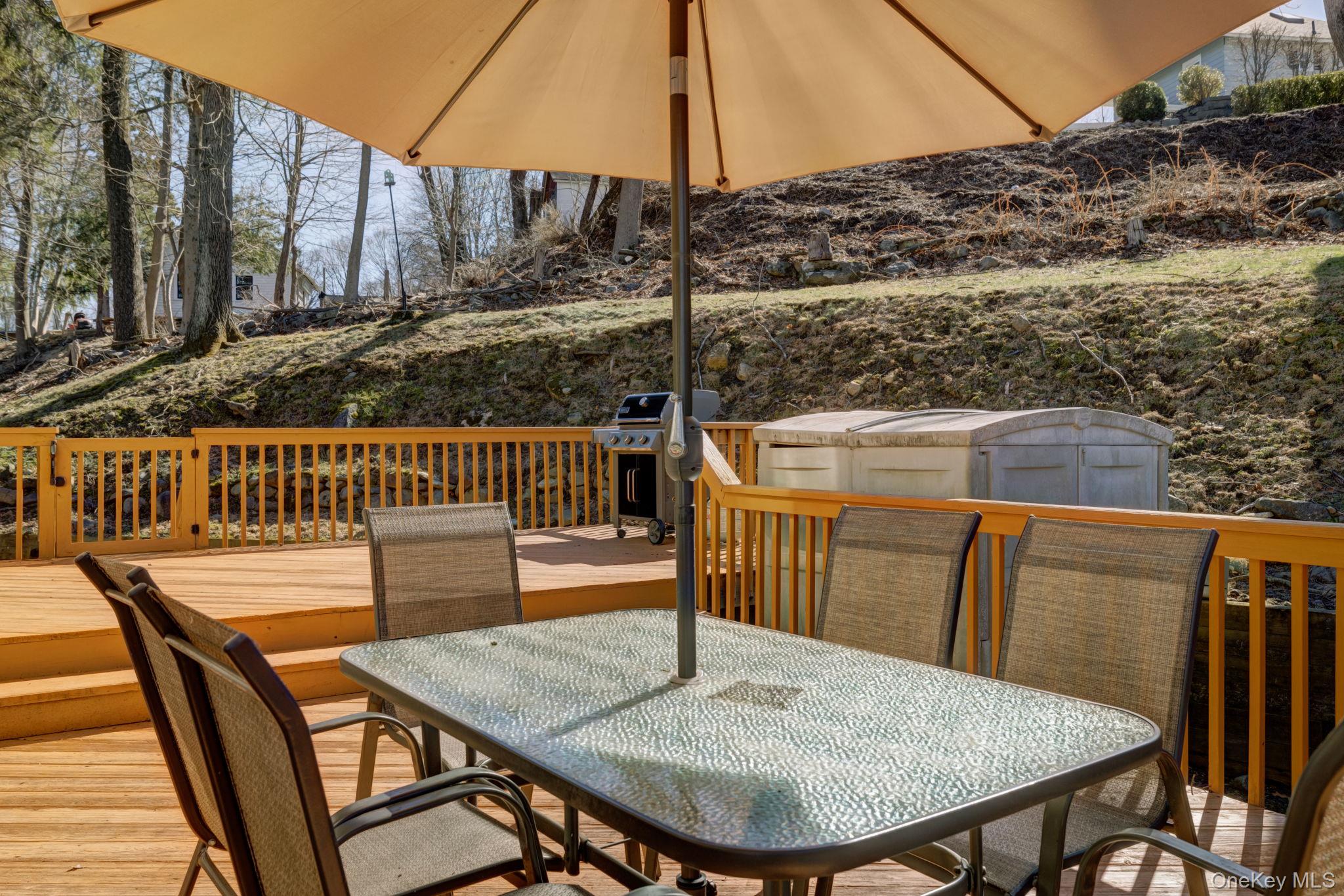65 Jay Street Stony Point, NY 10980 - Photo 4 of 32 a view of balcony with wooden floor and outdoor seating