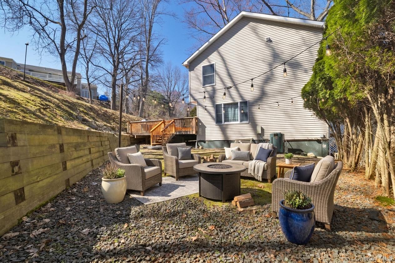 65 Jay Street Stony Point, NY 10980 - Photo 5 of 32 a backyard of a house with outdoor seating