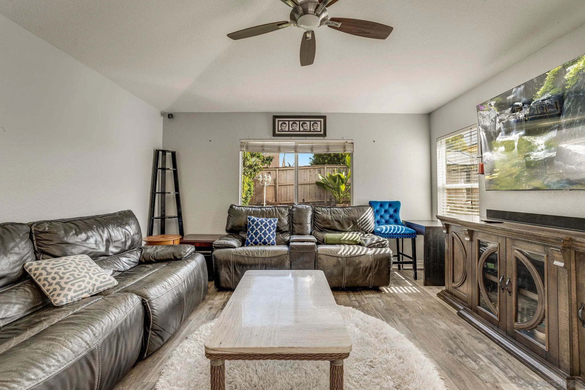 1616 Gold Run Road Chula Vista, CA 91913 - Photo 12 of 35 a living room with furniture and a flat screen tv