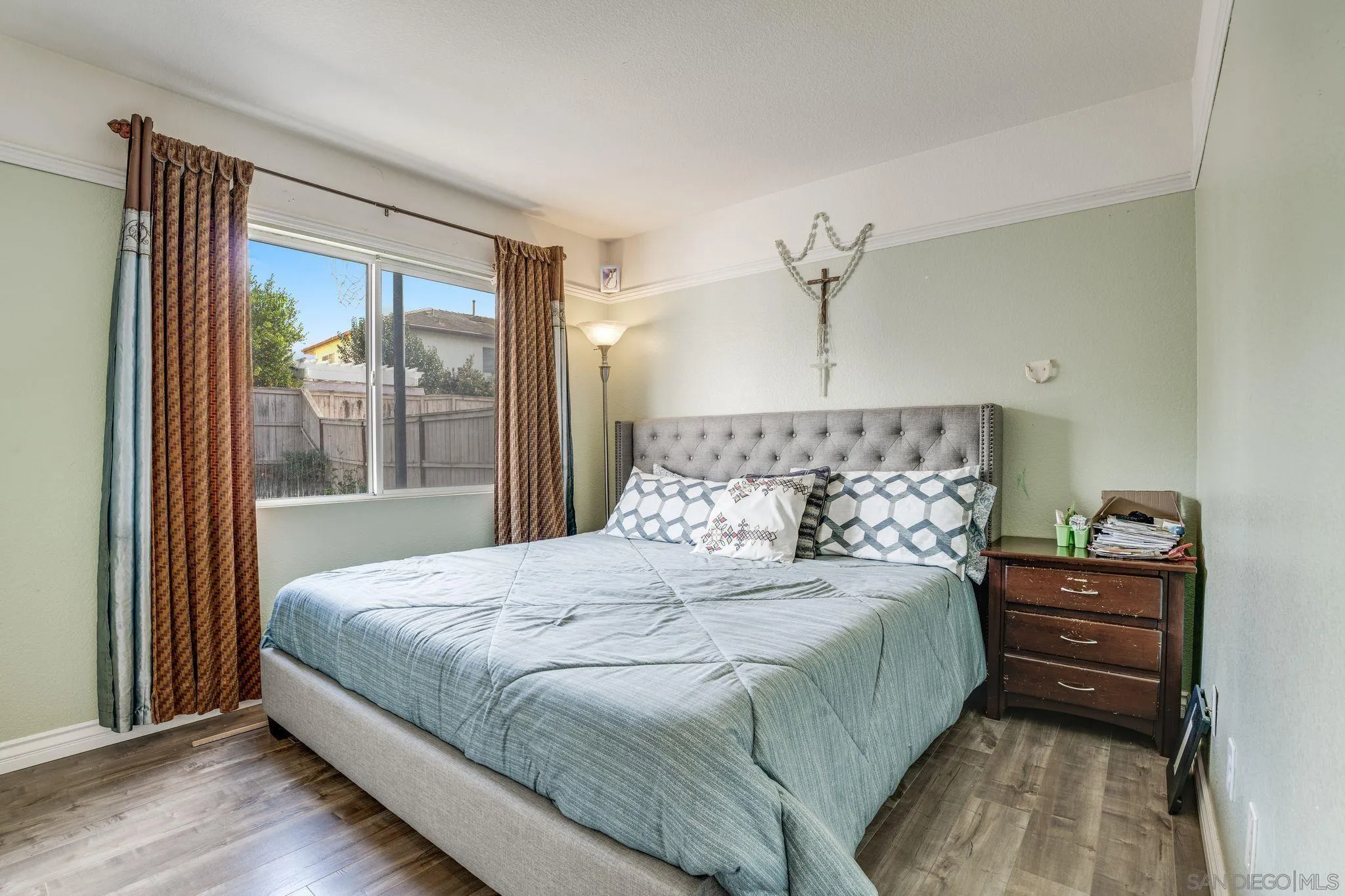 1616 Gold Run Road Chula Vista, CA 91913 - Photo 13 of 35 a bedroom with a bed and large window