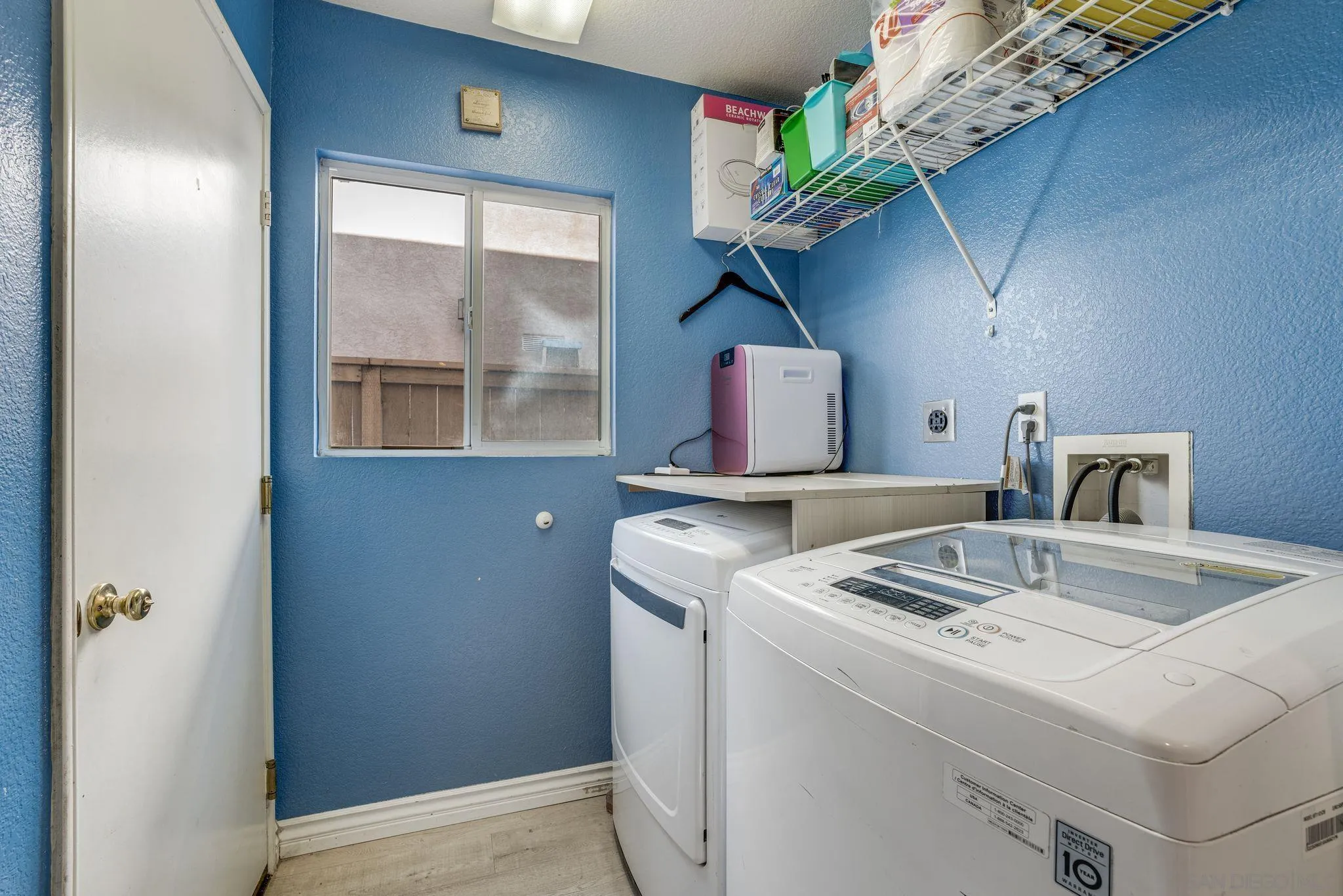 1616 Gold Run Road Chula Vista, CA 91913 - Photo 15 of 35 a view of kitchen sink with granite countertop cabinets