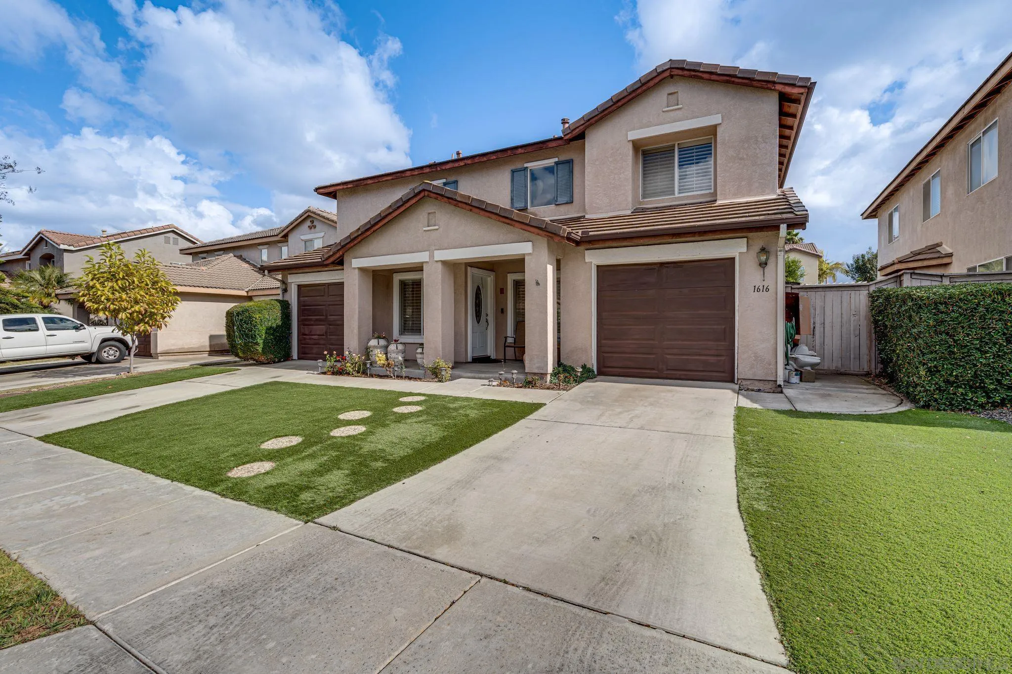 1616 Gold Run Road Chula Vista, CA 91913 - Photo 16 of 35 a front view of a house with a yard
