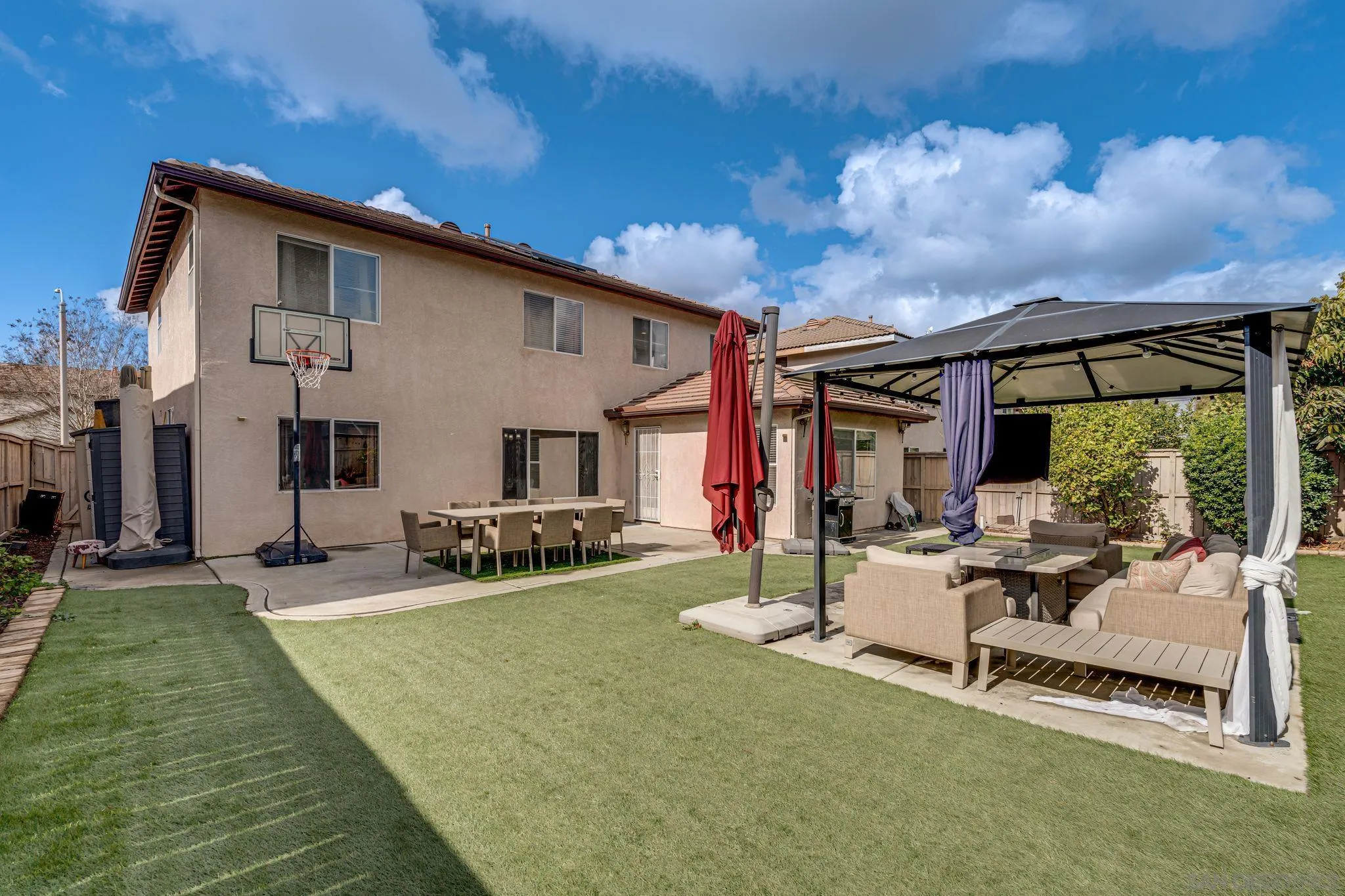 1616 Gold Run Road Chula Vista, CA 91913 - Photo 19 of 35 a view of a house with backyard porch and sitting area