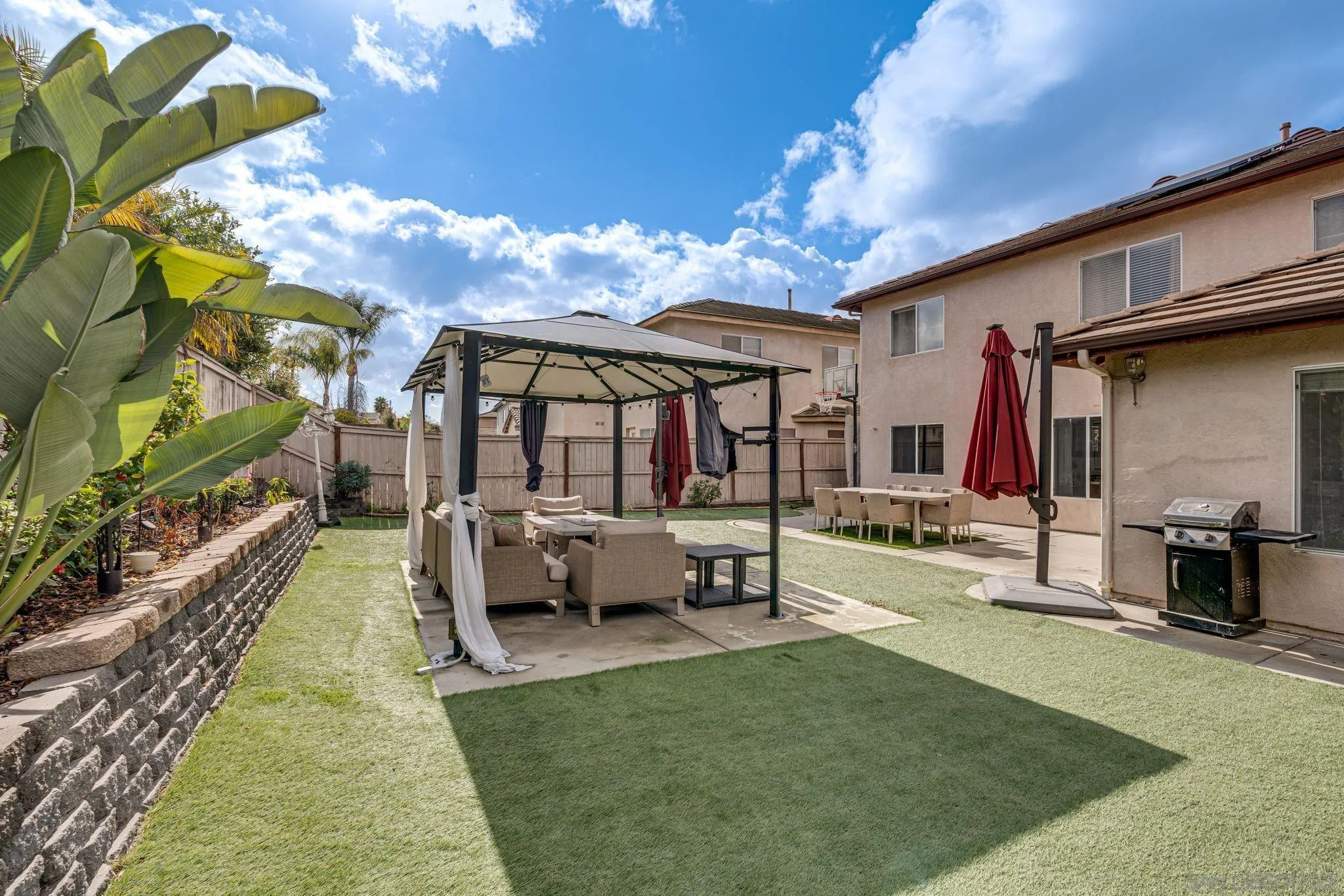 1616 Gold Run Road Chula Vista, CA 91913 - Photo 20 of 35 a view of a house with swimming pool and sitting area