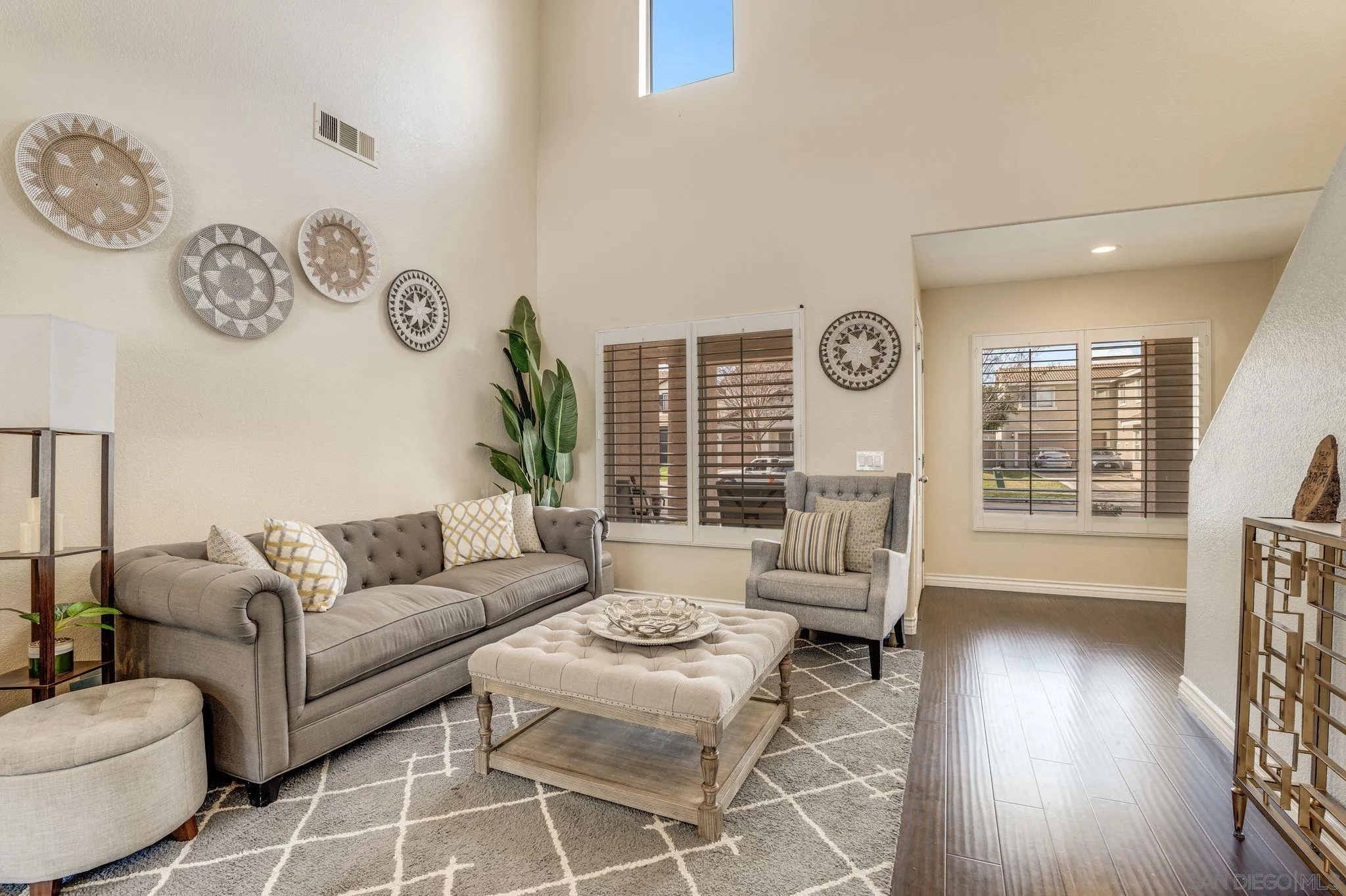 1616 Gold Run Road Chula Vista, CA 91913 - Photo 2 of 35 a living room with furniture and a large window