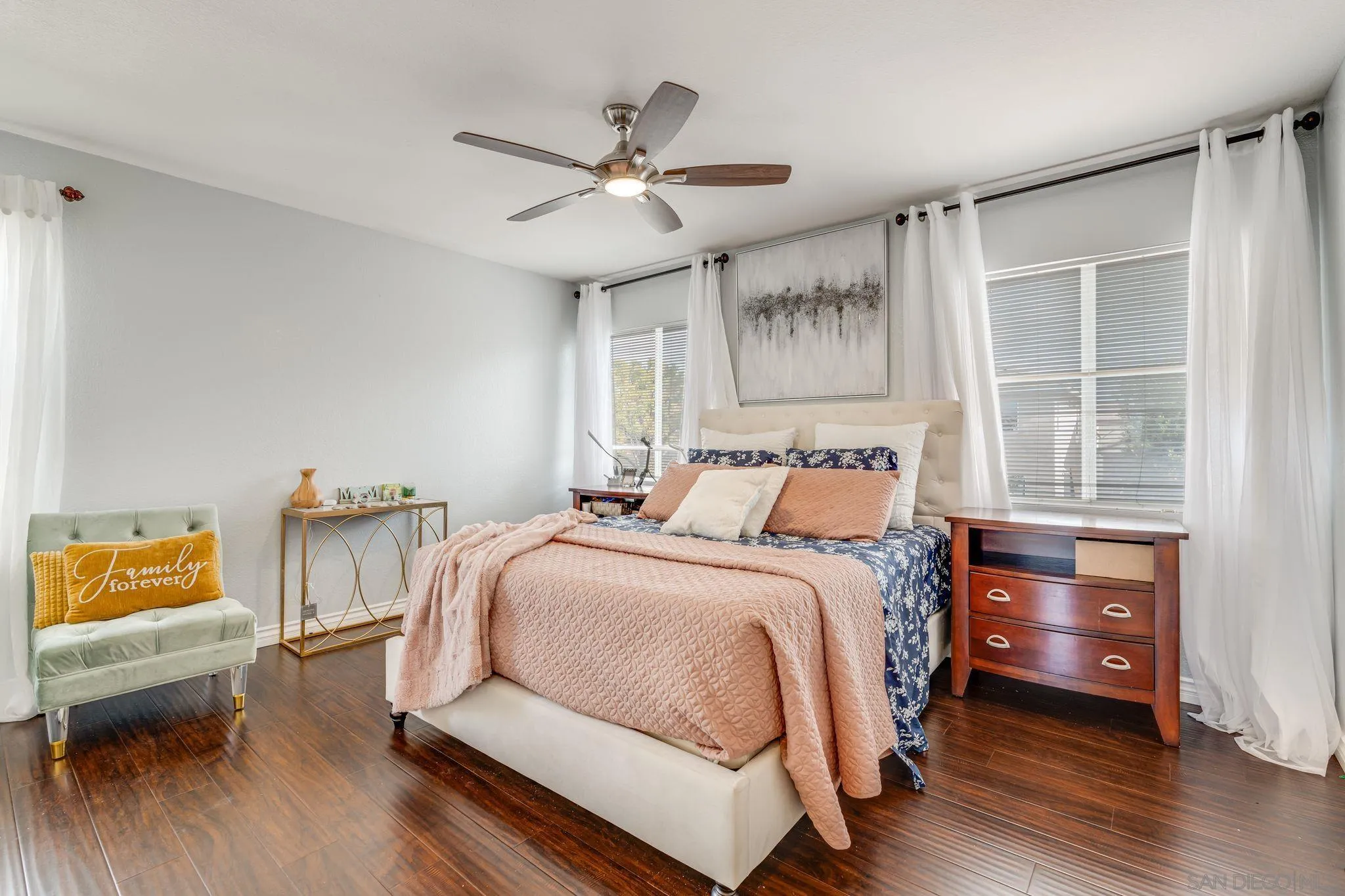 1616 Gold Run Road Chula Vista, CA 91913 - Photo 22 of 35 a bedroom with a bed and wooden floor