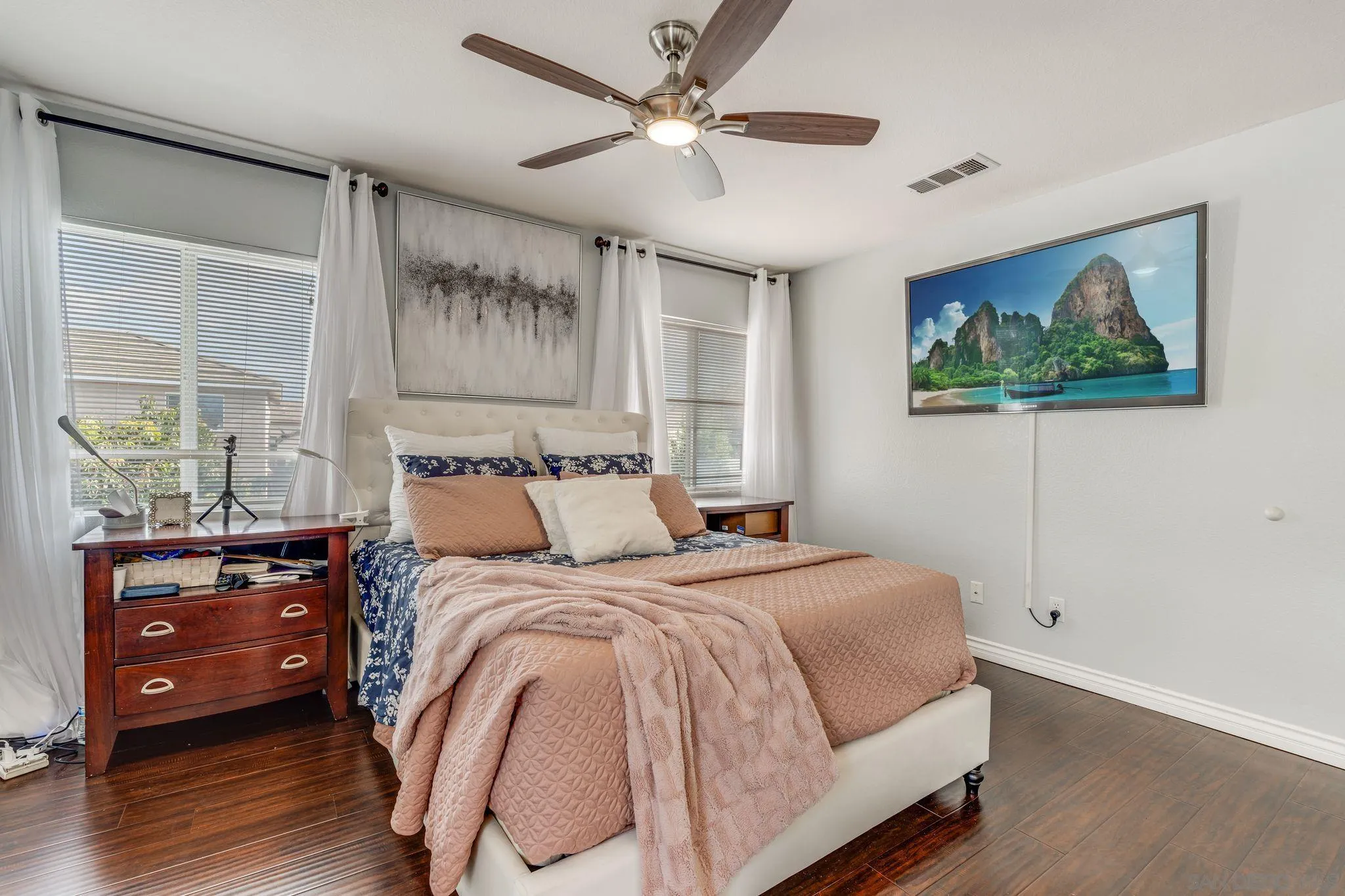 1616 Gold Run Road Chula Vista, CA 91913 - Photo 23 of 35 a bed room with a bed and a painting