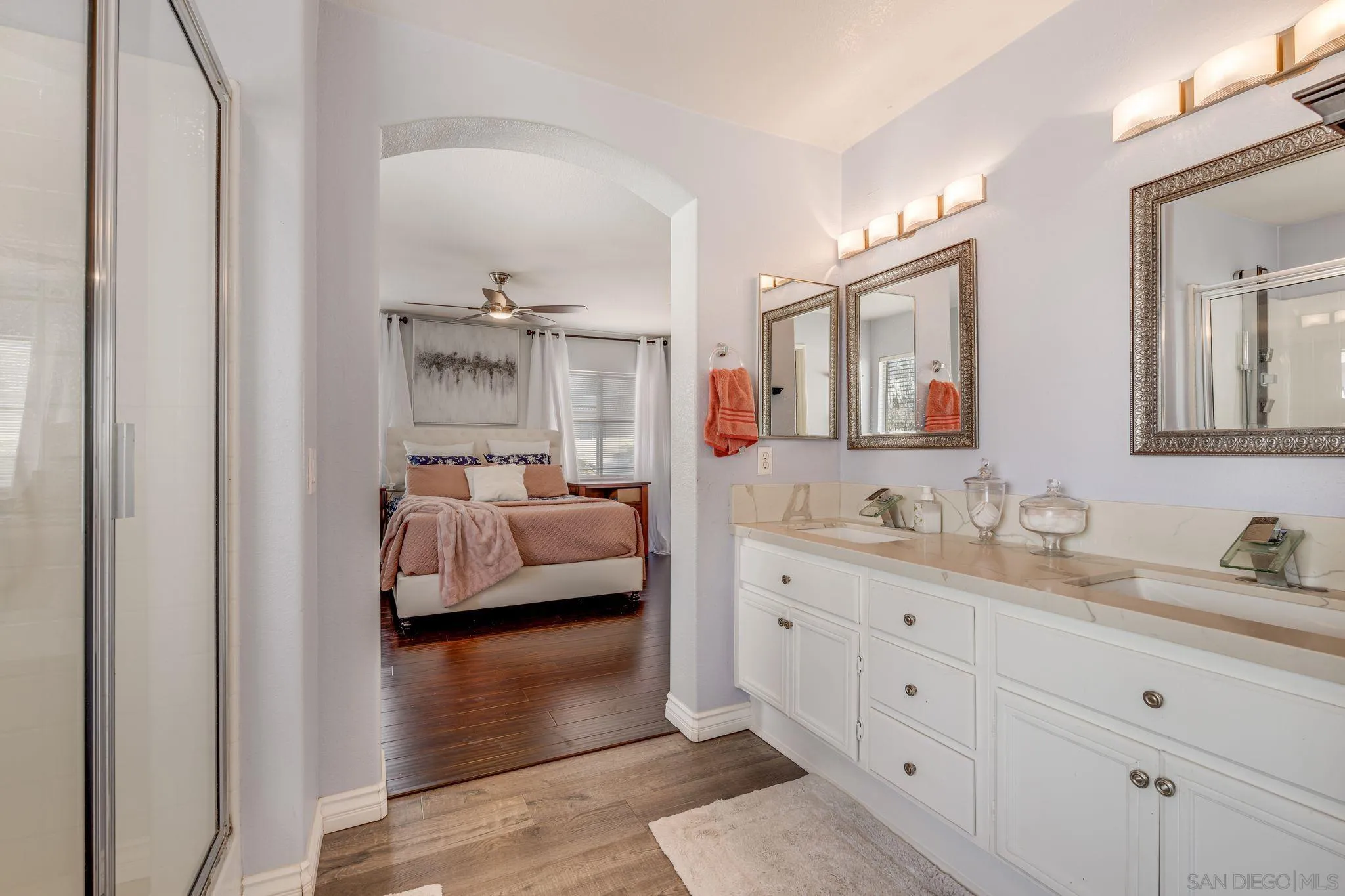 1616 Gold Run Road Chula Vista, CA 91913 - Photo 25 of 35 a en suite bathroom with double sink and a mirror