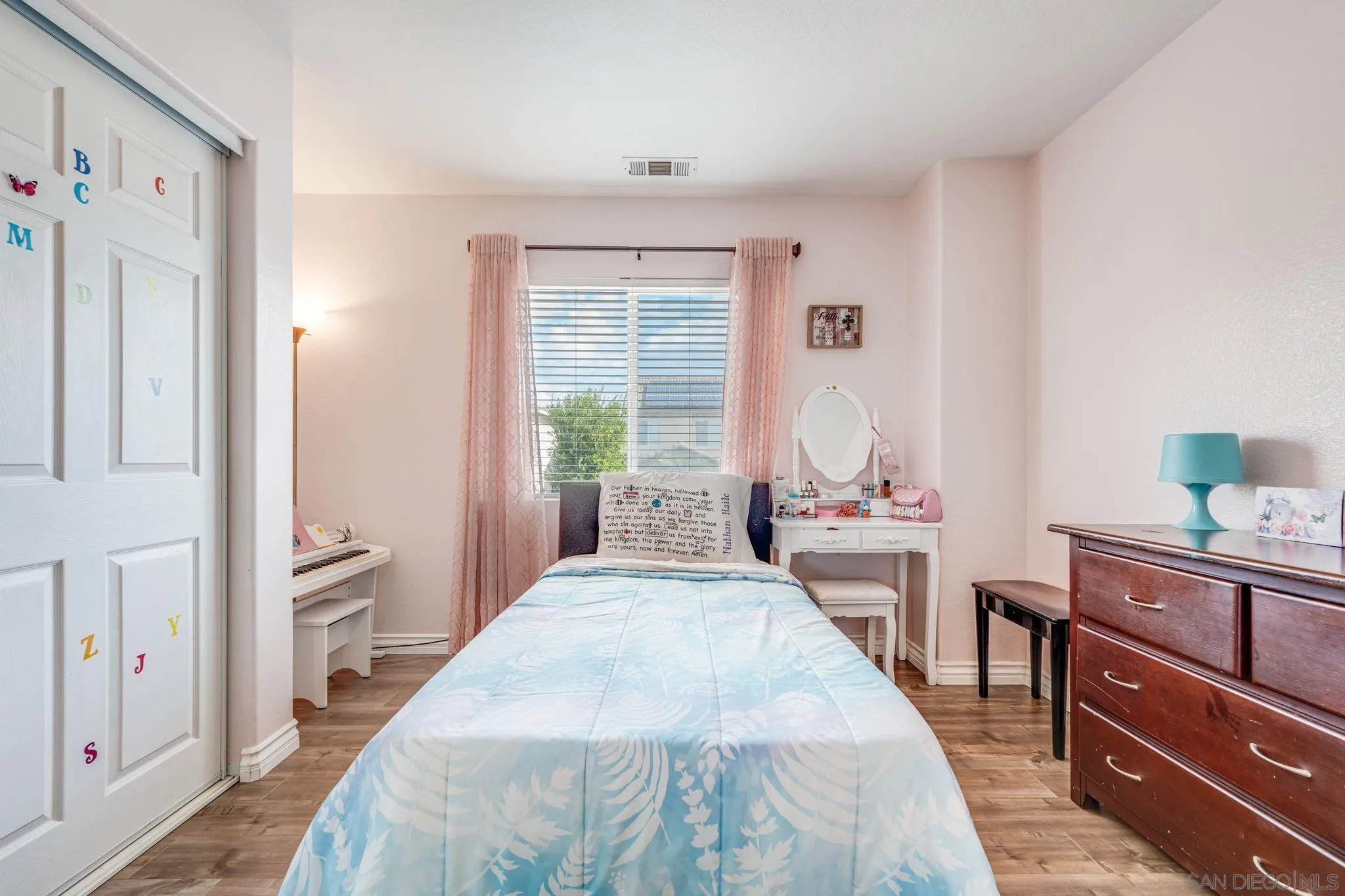 1616 Gold Run Road Chula Vista, CA 91913 - Photo 29 of 35 a bedroom with a bed and a dresser in it