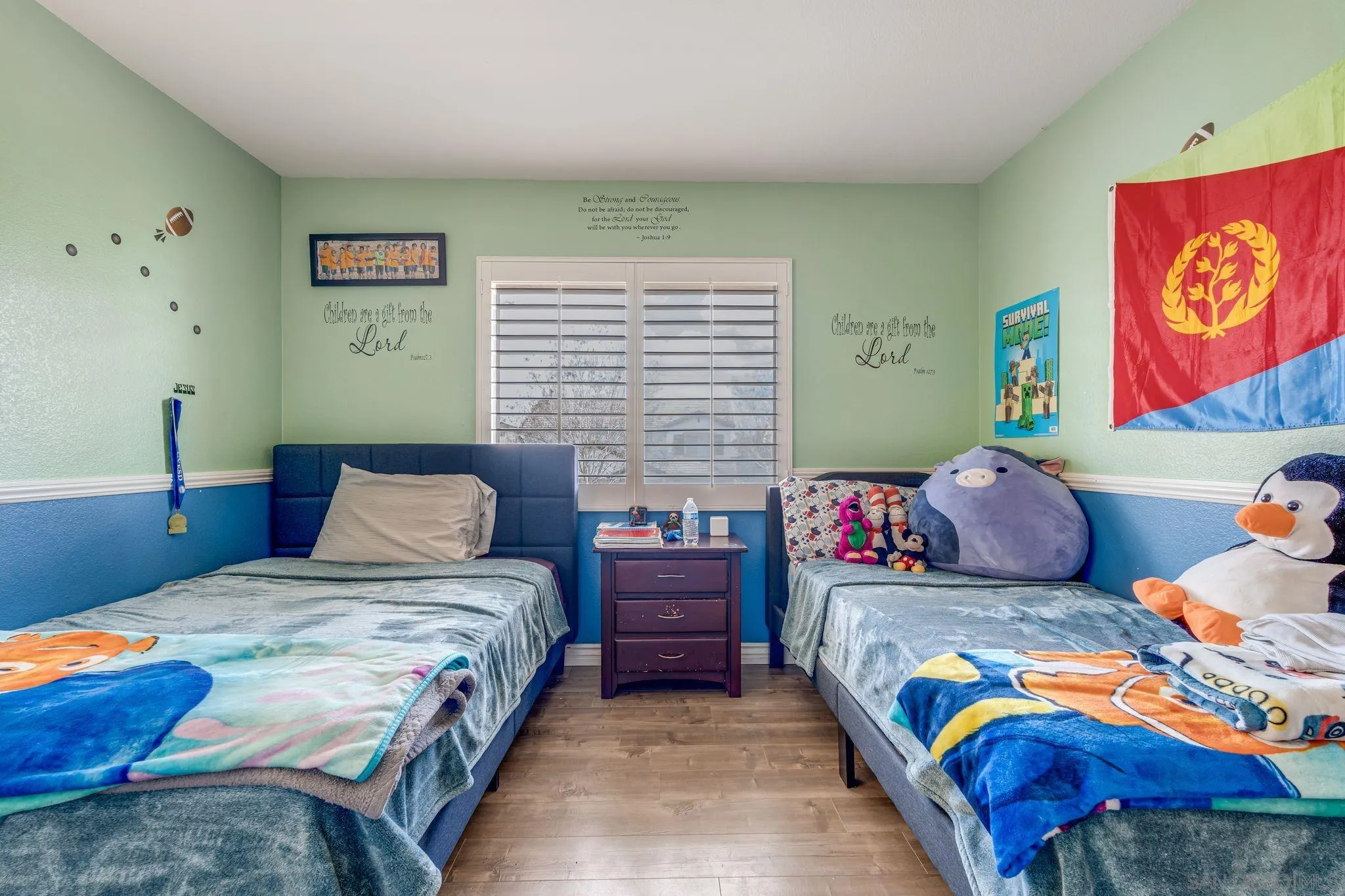 1616 Gold Run Road Chula Vista, CA 91913 - Photo 31 of 35 a bedroom with two beds and a painting on the wall