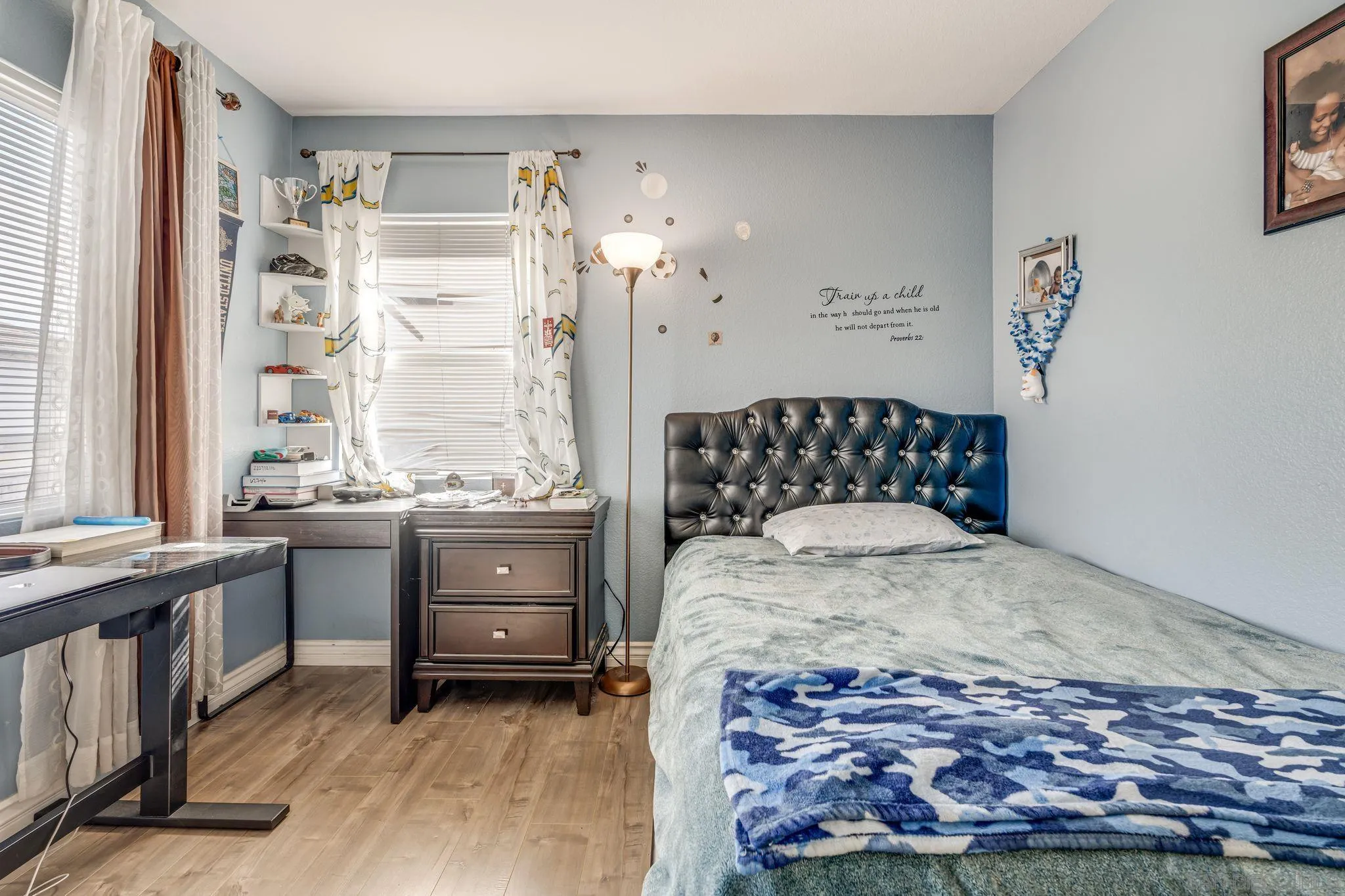 1616 Gold Run Road Chula Vista, CA 91913 - Photo 33 of 35 a bedroom with a bed and a window