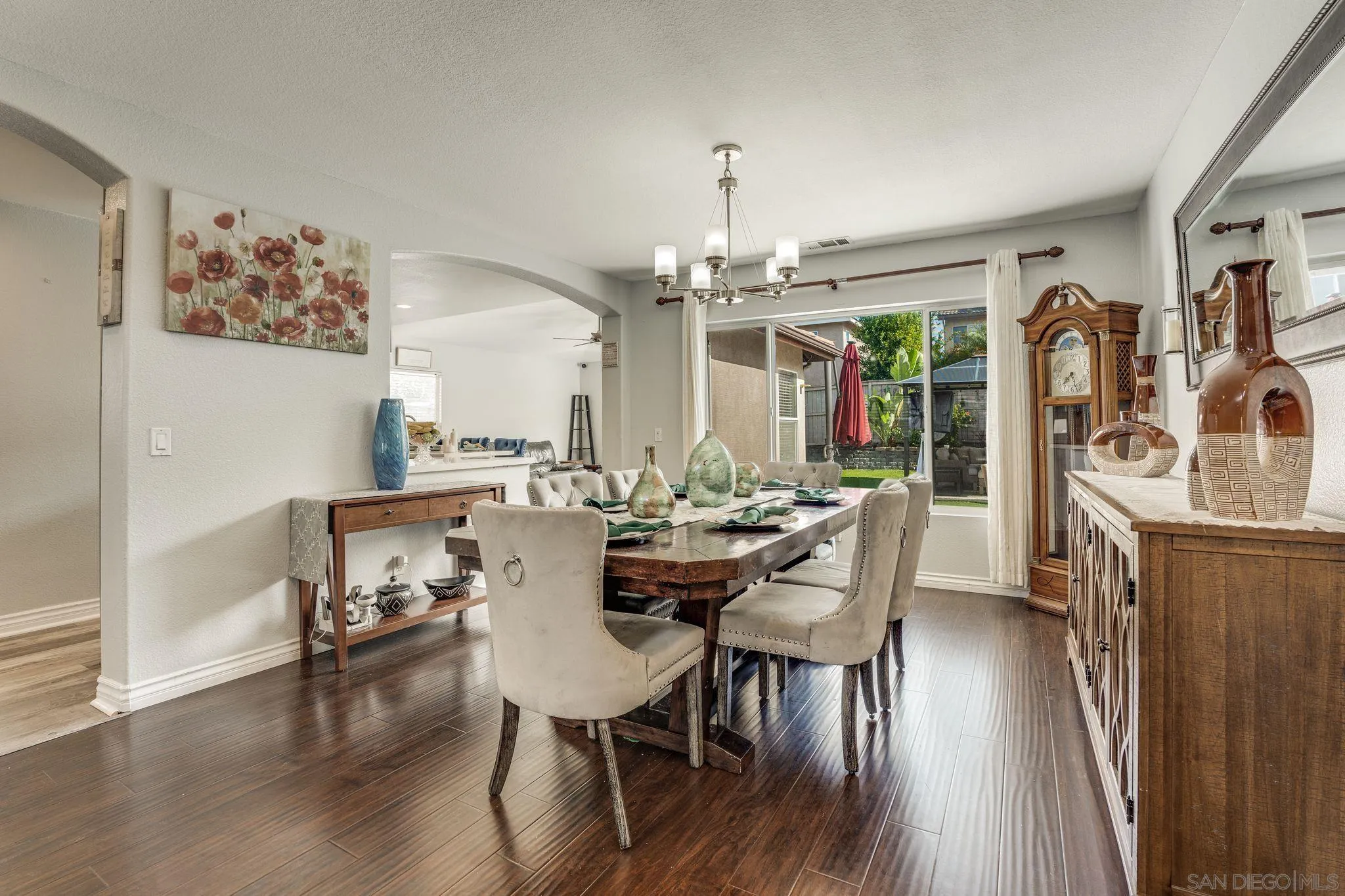 1616 Gold Run Road Chula Vista, CA 91913 - Photo 5 of 35 a view of a dining room with furniture and wooden floor