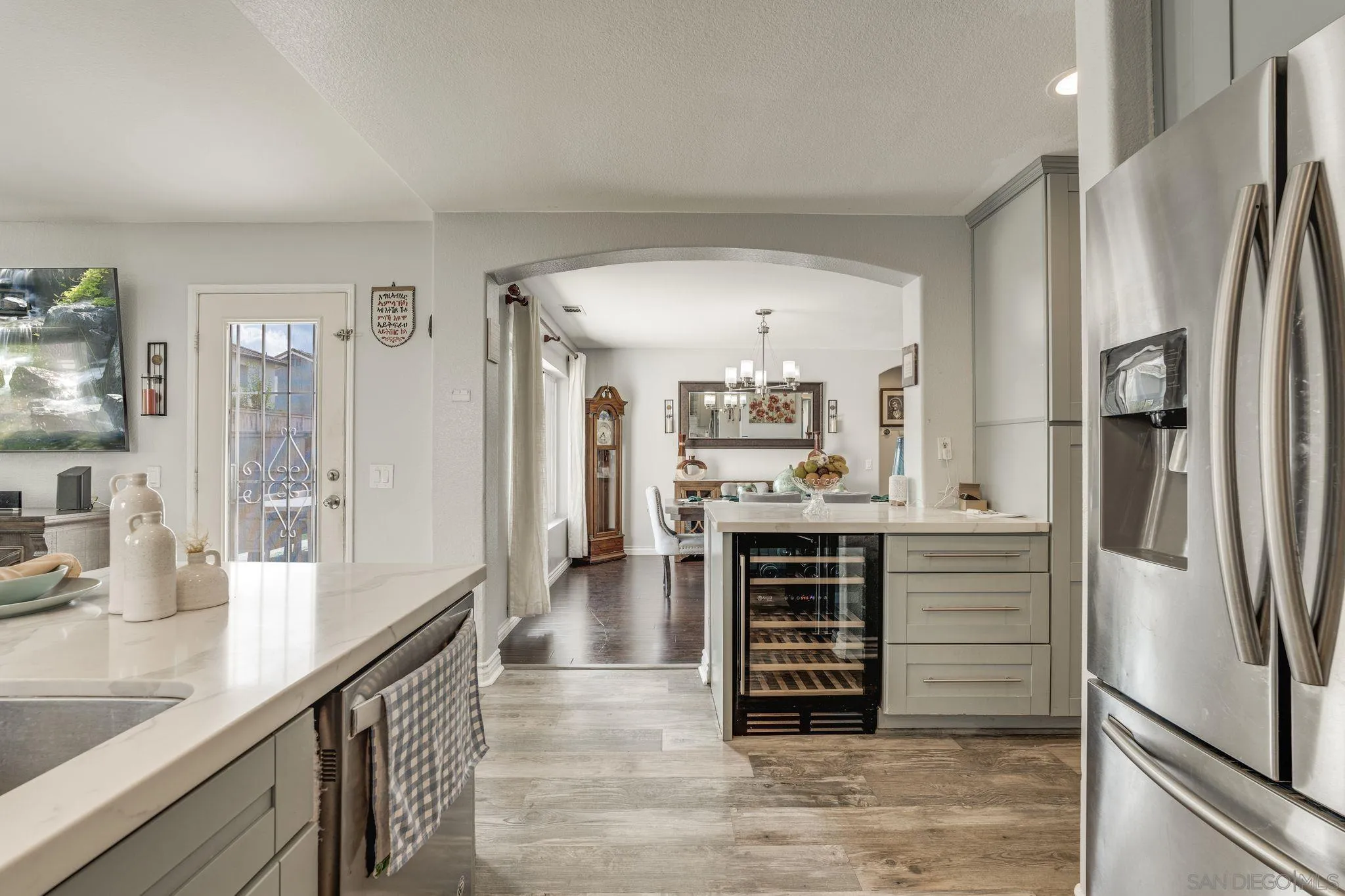 1616 Gold Run Road Chula Vista, CA 91913 - Photo 9 of 35 a kitchen with stainless steel appliances a refrigerator and a sink
