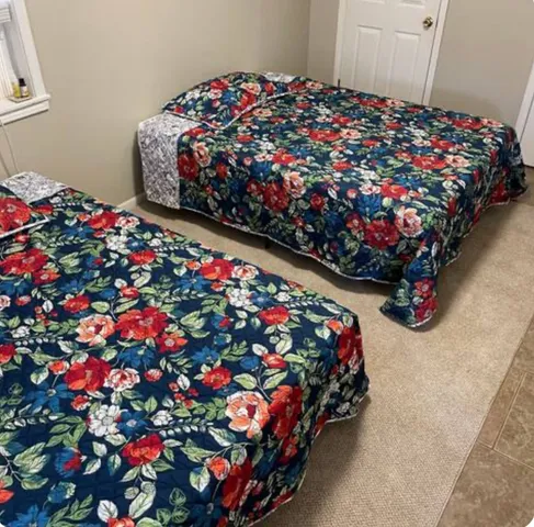 an aerial view of a house with a swimming pool