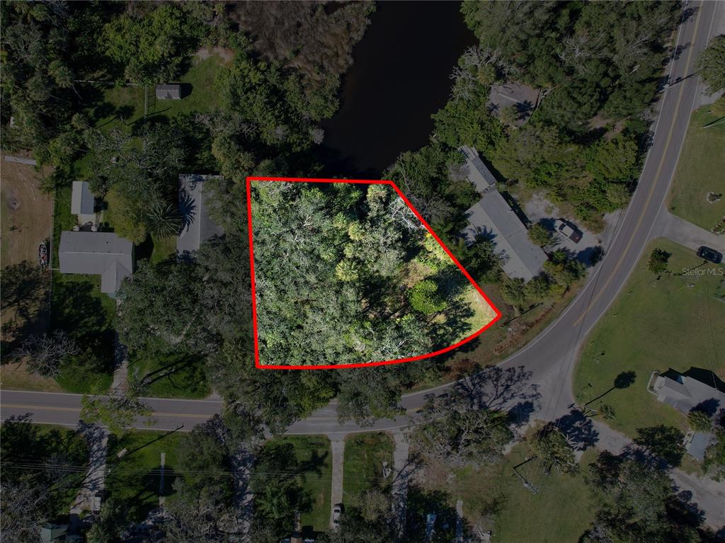 18905 Aripeka Road Aripeka, FL 34679 - Photo 16 of 43 an aerial view of a house