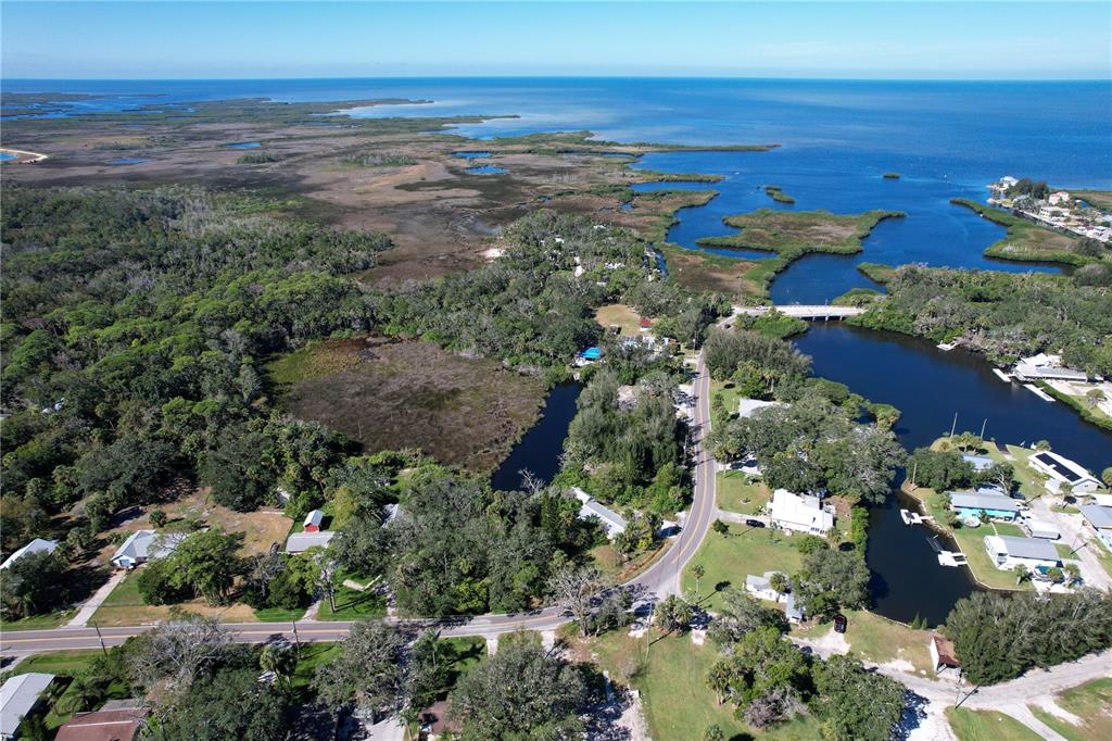 18905 Aripeka Road Aripeka, FL 34679 - Photo 32 of 43 a view of an ocean and beach