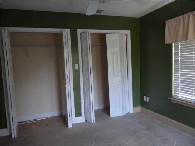 70 Cypress Lane Freeport, FL 32439 - Photo 11 of 21 an empty room with windows
