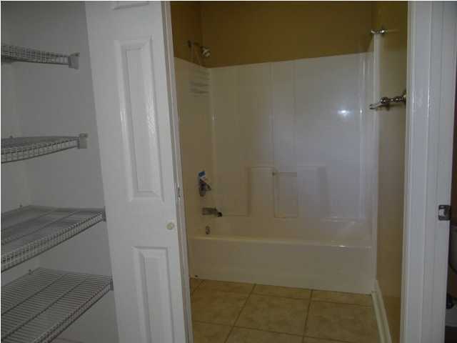 70 Cypress Lane Freeport, FL 32439 - Photo 13 of 21 a bathroom with a shower