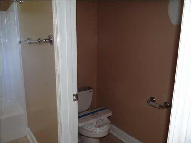 70 Cypress Lane Freeport, FL 32439 - Photo 14 of 21 a bathroom with a toilet