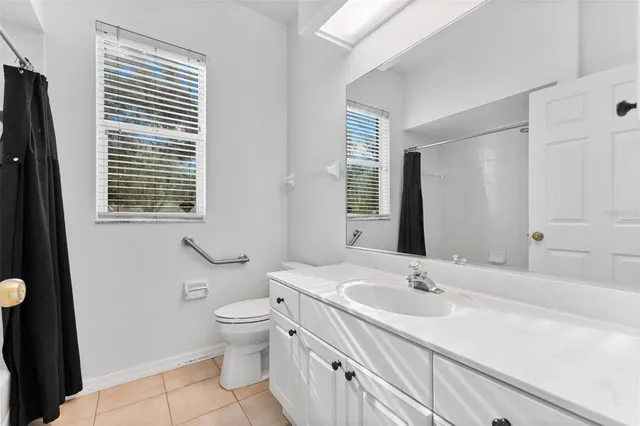 a view of a swimming pool with a lounge chair