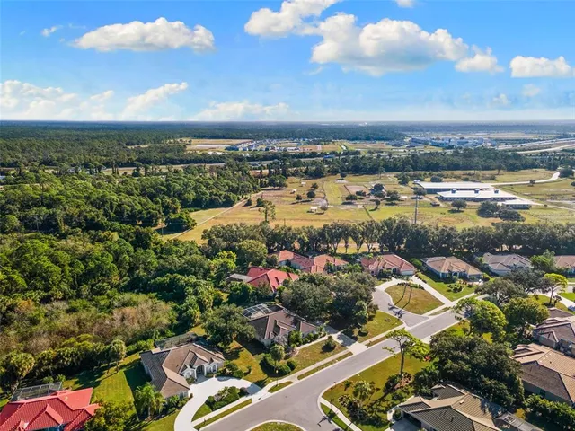 a sign that is sitting in front of flowers