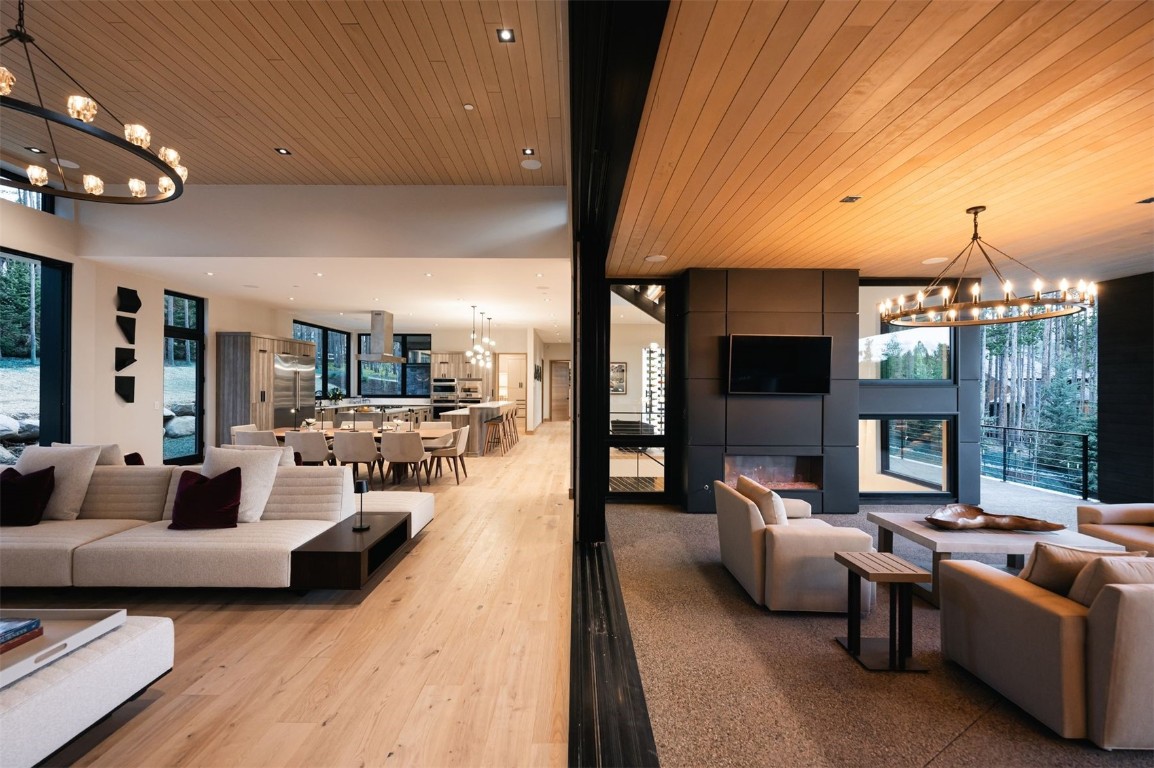 119 Boulder Circle Breckenridge, CO 80424 - Photo 12 of 50 a living room with furniture and a chandelier