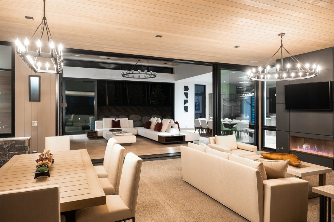 119 Boulder Circle Breckenridge, CO 80424 - Photo 16 of 50 a living room with furniture and a chandelier